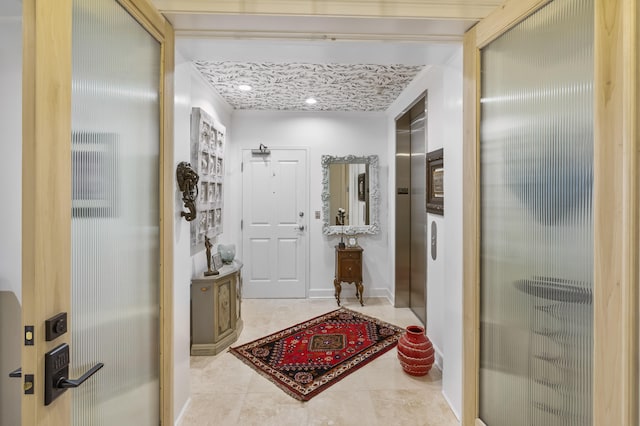 interior space featuring light tile patterned floors