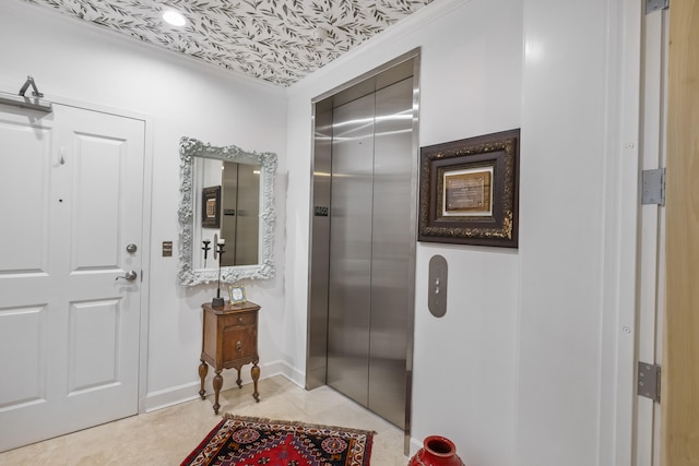 bathroom featuring elevator and crown molding