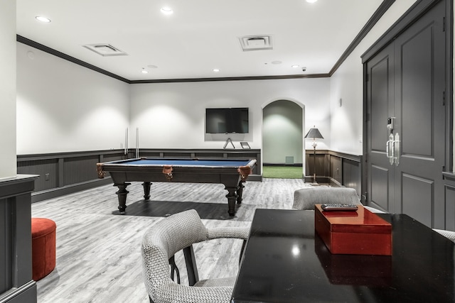 game room featuring pool table, hardwood / wood-style floors, and ornamental molding