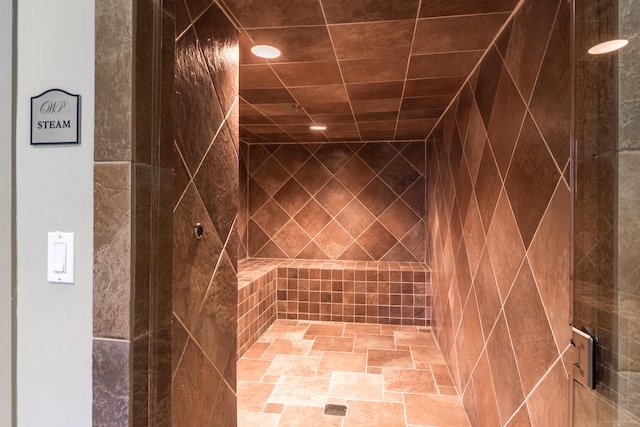 interior space featuring a tile shower