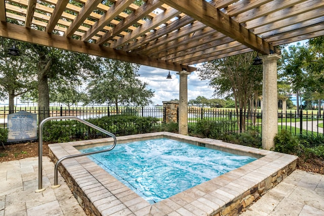 view of swimming pool with a pergola, a hot tub, and a patio area