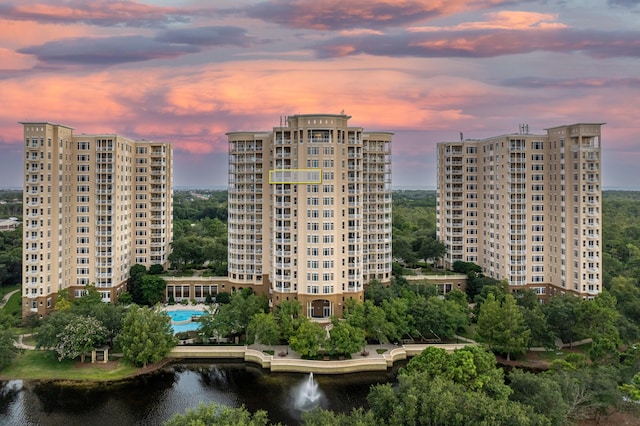 outdoor building at dusk with a water view