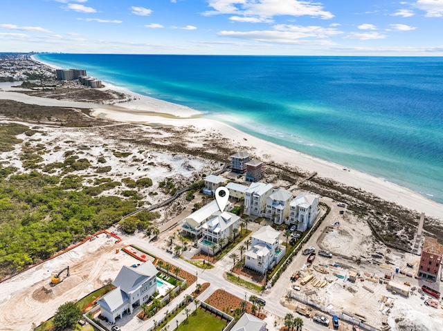 aerial view featuring a view of the beach and a water view