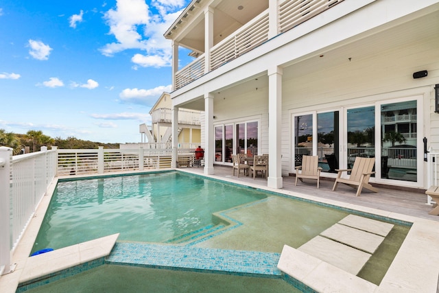 view of pool featuring a patio