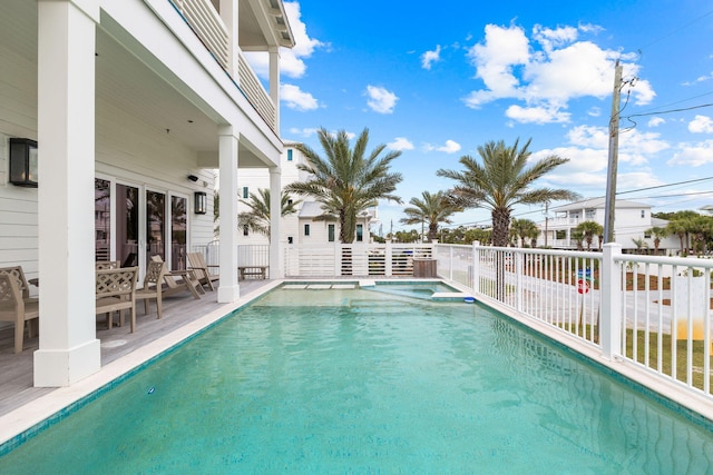 view of swimming pool with a patio area