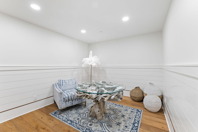 sitting room with light hardwood / wood-style floors