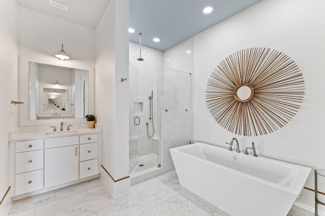 bathroom featuring vanity with extensive cabinet space, tile flooring, and plus walk in shower