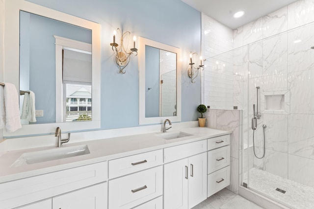 bathroom with an enclosed shower, double vanity, and tile flooring