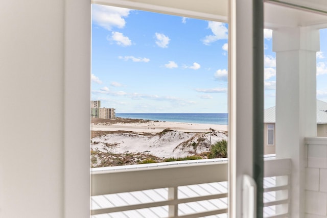 property view of water featuring a beach view