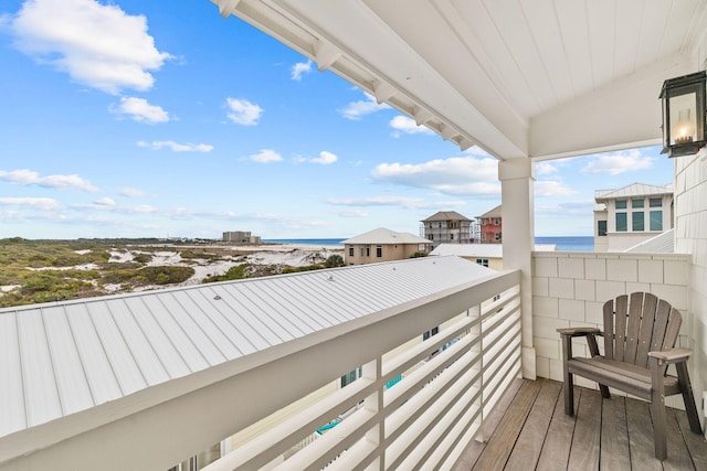 balcony featuring a water view