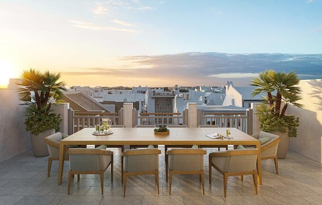 view of patio terrace at dusk