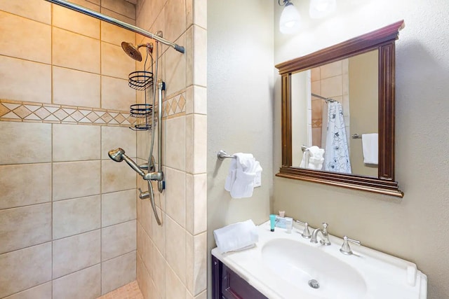 bathroom featuring sink and a shower with curtain