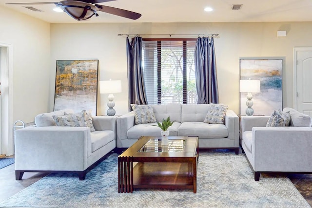 tiled living room featuring ceiling fan