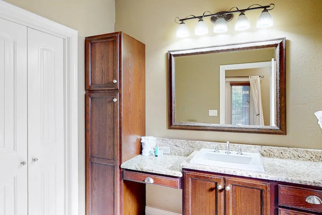 bathroom featuring vanity