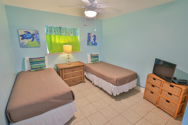 bedroom featuring ceiling fan and light tile flooring