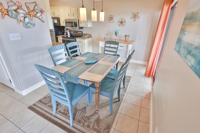 dining room with light tile flooring