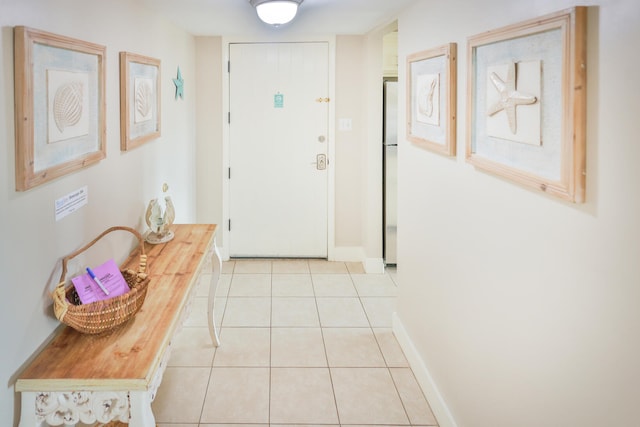 hallway with light tile flooring