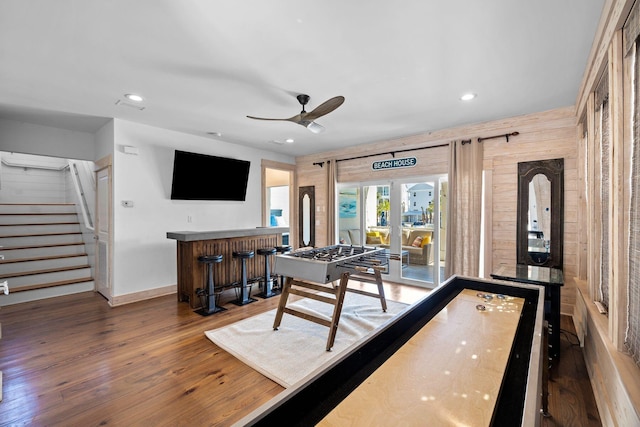 game room featuring french doors, dark hardwood / wood-style flooring, and ceiling fan