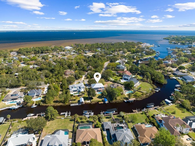 birds eye view of property featuring a water view