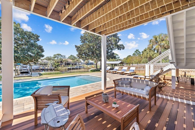 view of pool with a wooden deck