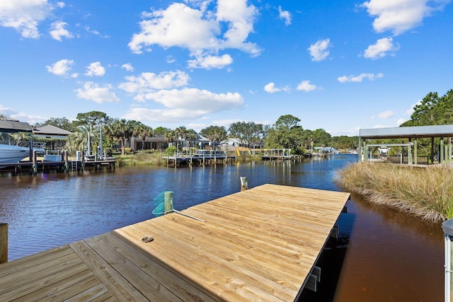 dock area featuring a water view