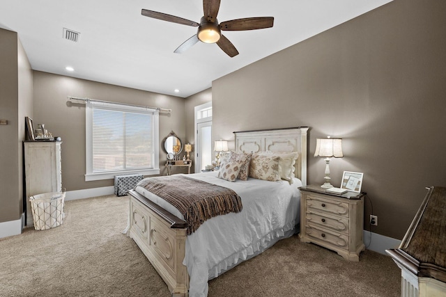 carpeted bedroom featuring ceiling fan