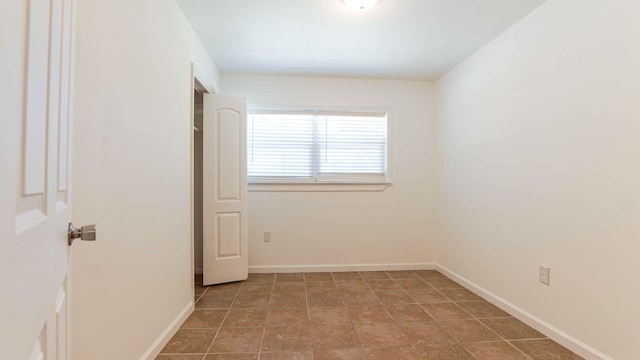 view of tiled spare room