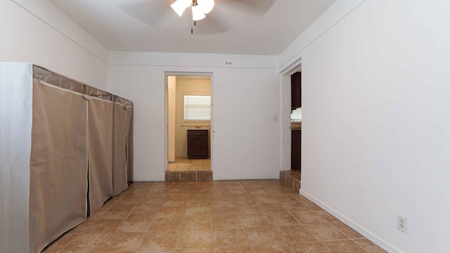 corridor with light tile floors