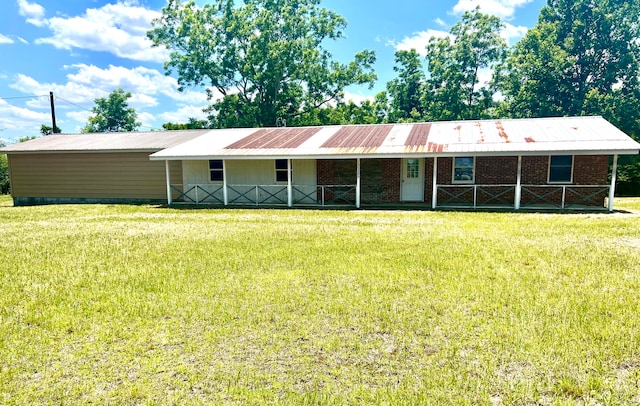 ranch-style home with a front yard