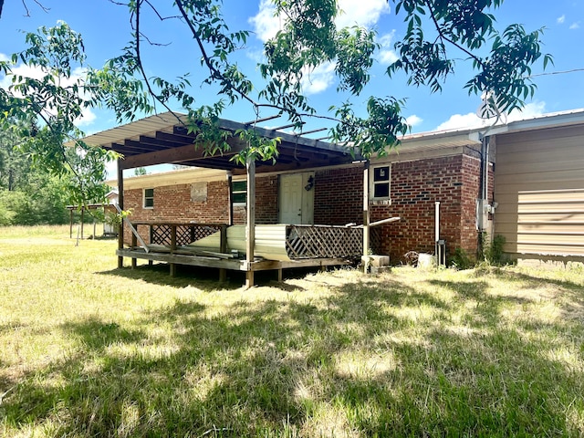 view of yard with a wooden deck