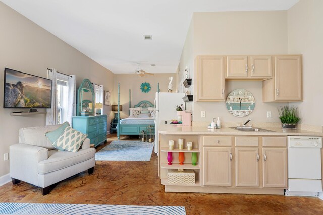 bedroom featuring sink and concrete flooring