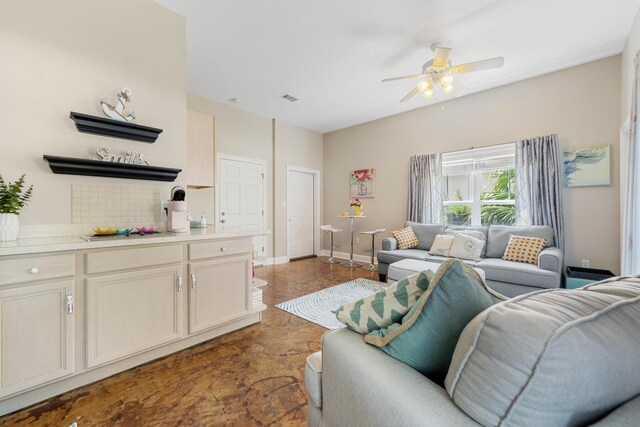 living room featuring ceiling fan