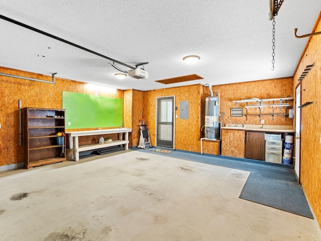 garage featuring water heater, electric panel, a garage door opener, and wooden walls