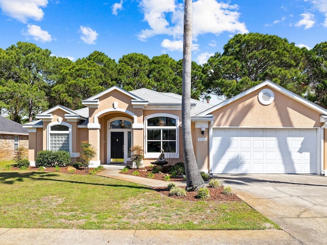 single story home with a front lawn and a garage