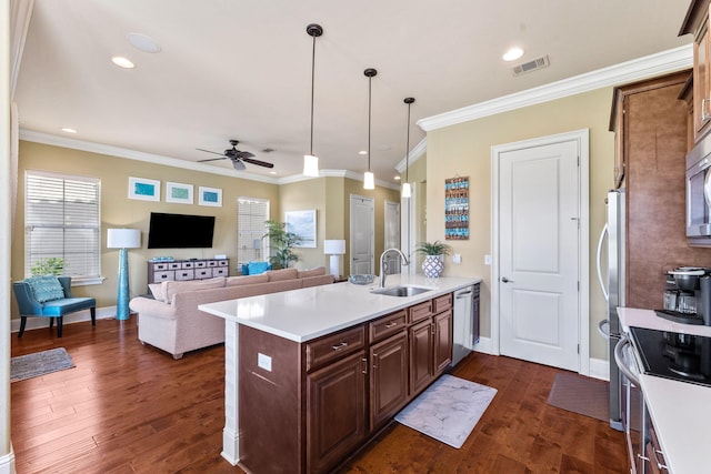 kitchen with dark hardwood / wood-style floors, sink, ceiling fan, and pendant lighting