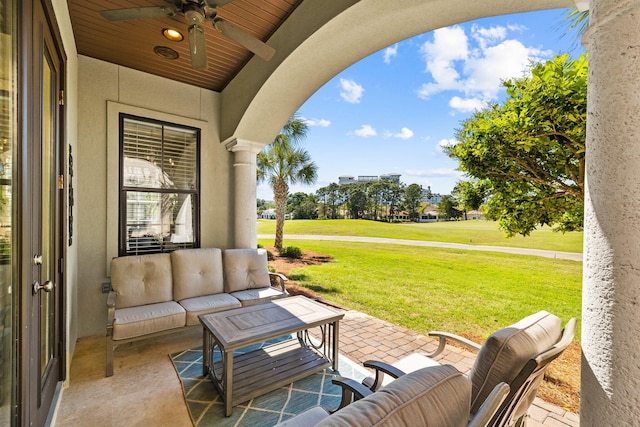 view of patio / terrace featuring an outdoor living space and ceiling fan