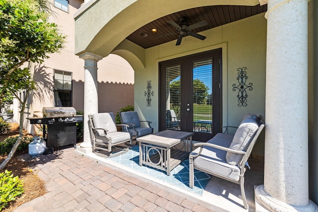 view of patio / terrace featuring a grill, outdoor lounge area, ceiling fan, and french doors