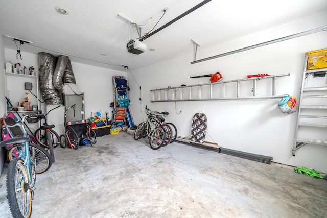 garage featuring a garage door opener