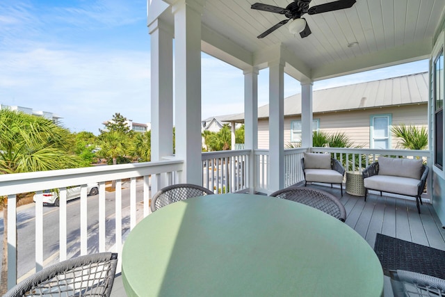 exterior space with ceiling fan