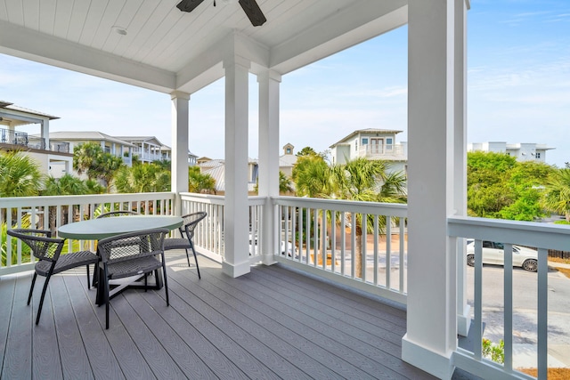 wooden deck with ceiling fan