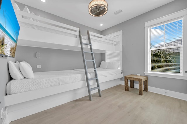 bedroom with light hardwood / wood-style flooring