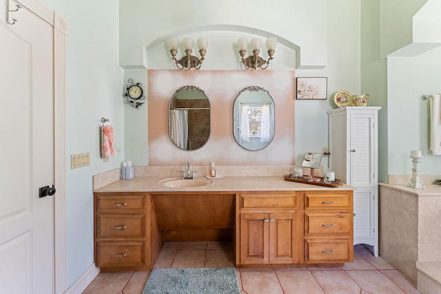 bathroom featuring tile flooring and vanity