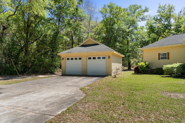 garage with a lawn