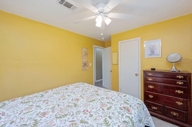 bedroom with light carpet and ceiling fan