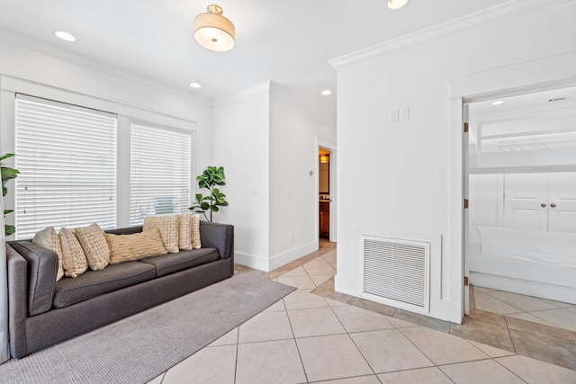 living room with crown molding and light tile floors