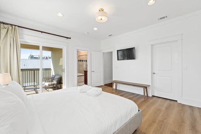 bedroom with crown molding, light hardwood / wood-style flooring, access to outside, and ensuite bathroom