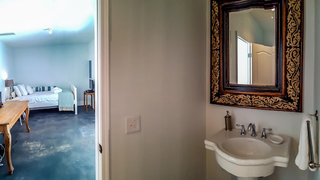 bathroom with concrete floors and sink