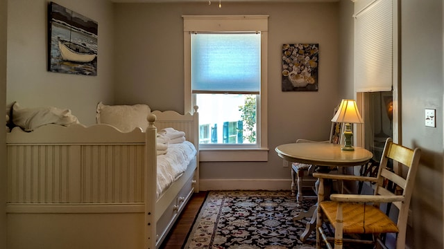 bedroom featuring dark hardwood / wood-style floors