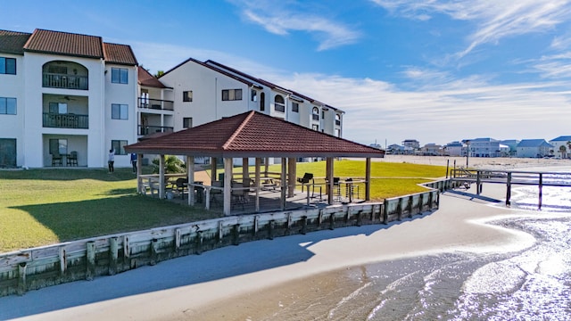 surrounding community featuring a gazebo and a yard