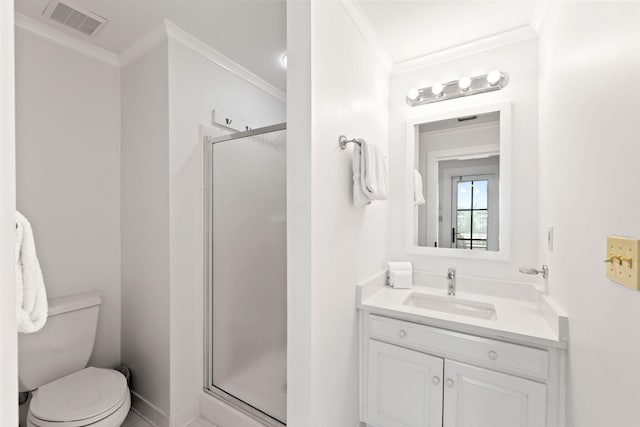 bathroom with ornamental molding, oversized vanity, toilet, and a shower with shower door